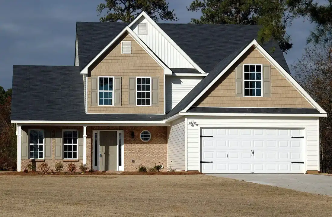 Residential home exterior in an Alaska neighborhood served for emergency water damage repair